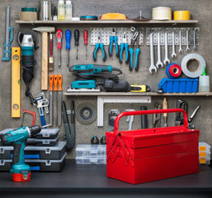 Organized workshop with tools and a red toolbox.
