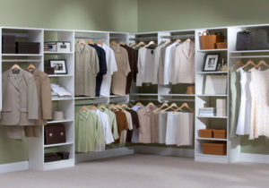 Organized walk-in closets with neatly arranged clothes and storage compartments.
