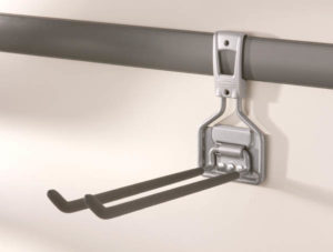 Metallic bracket mounted on a horizontal bar with two protruding hooks.